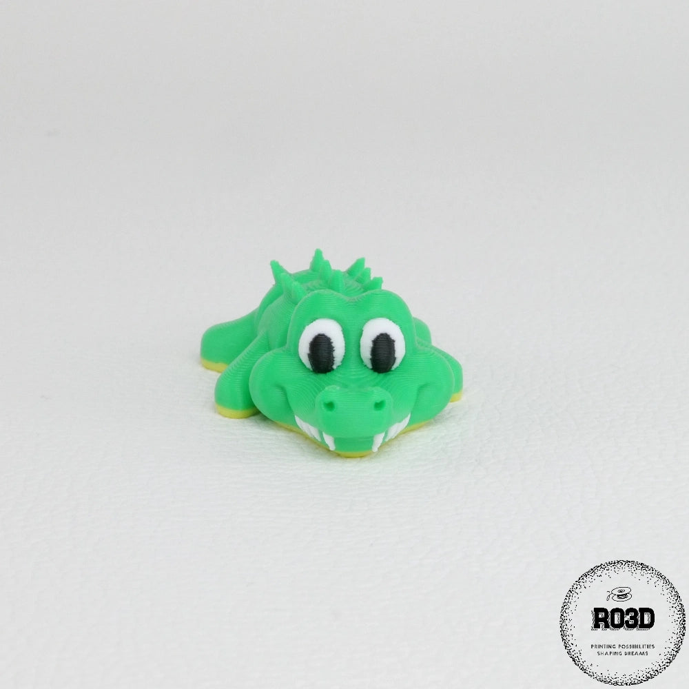 Crocodil cute articulat - detaliu solzi și corp segmentat verde