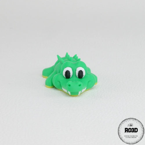 Crocodil cute articulat - detaliu solzi și corp segmentat verde