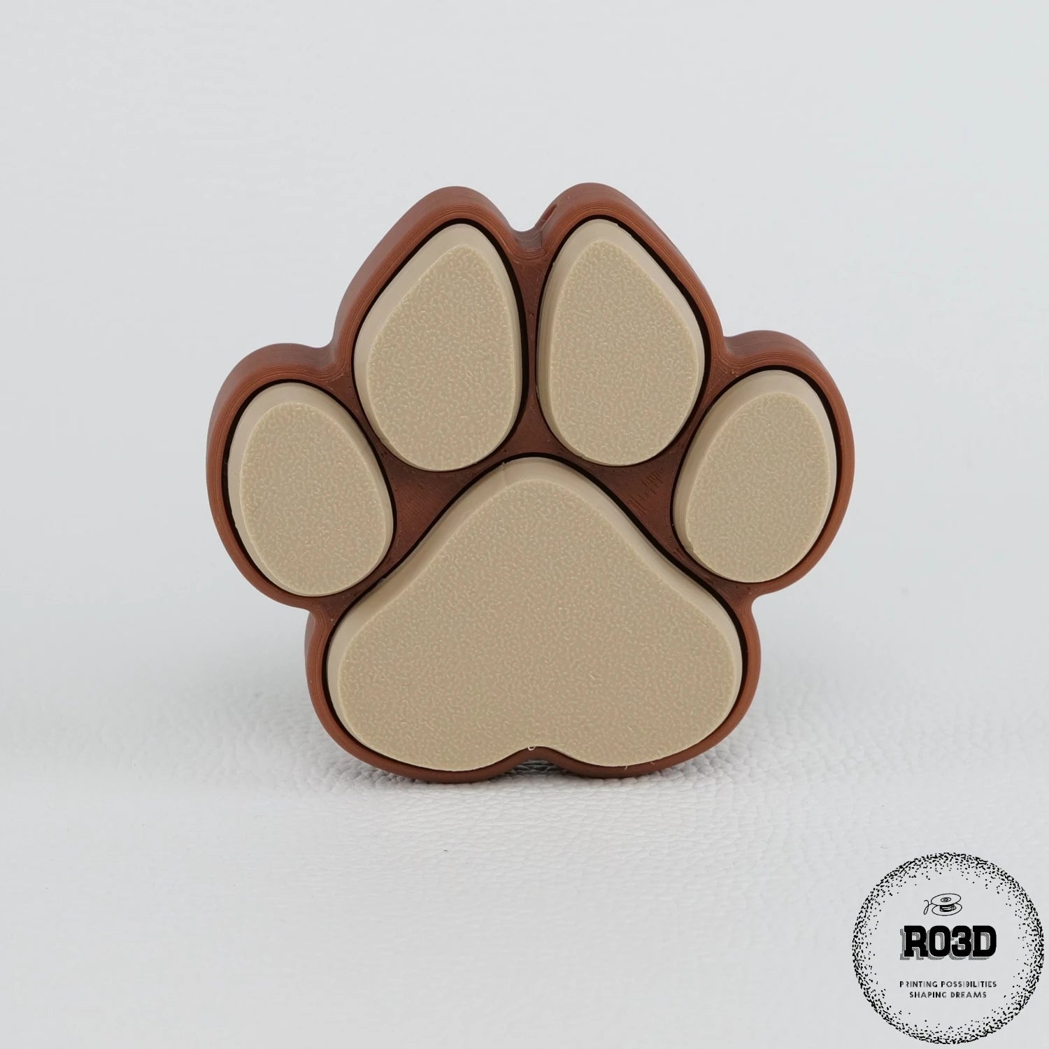 Breloc lăbuță de câine 3D cu click satisfăcător