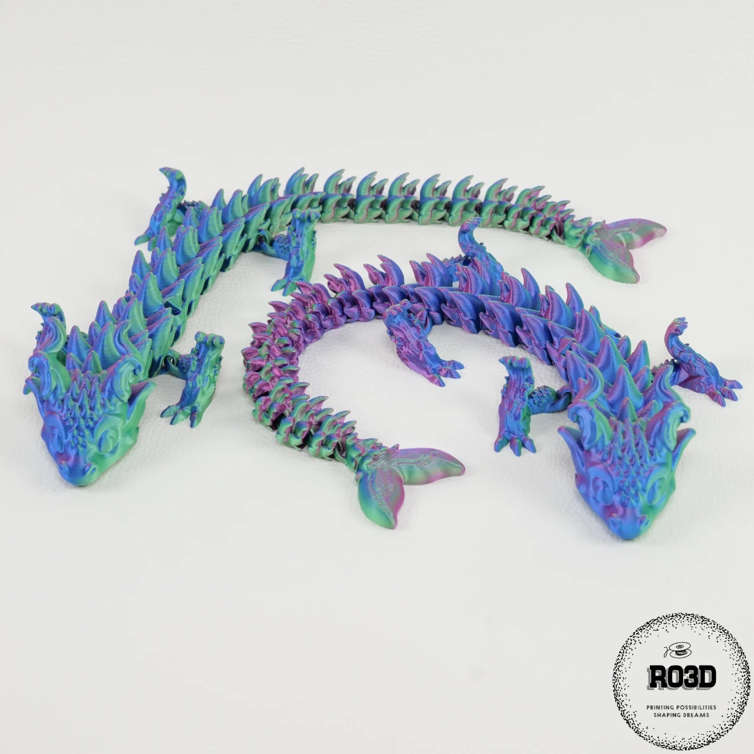 Dragon articulat Emerald Tide - detaliu aripi și corp cu tonuri smarald, figură 3D de calitate superioară RO3D