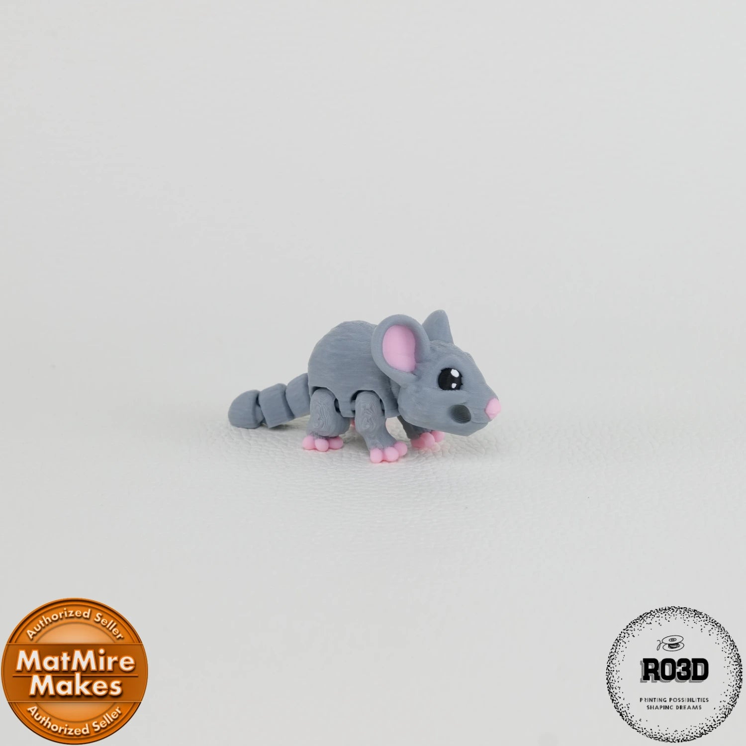 : Mini Mouse - Șoricel Articulat 3D, vedere laterală cu corp segmentat articulat și coadă lungă