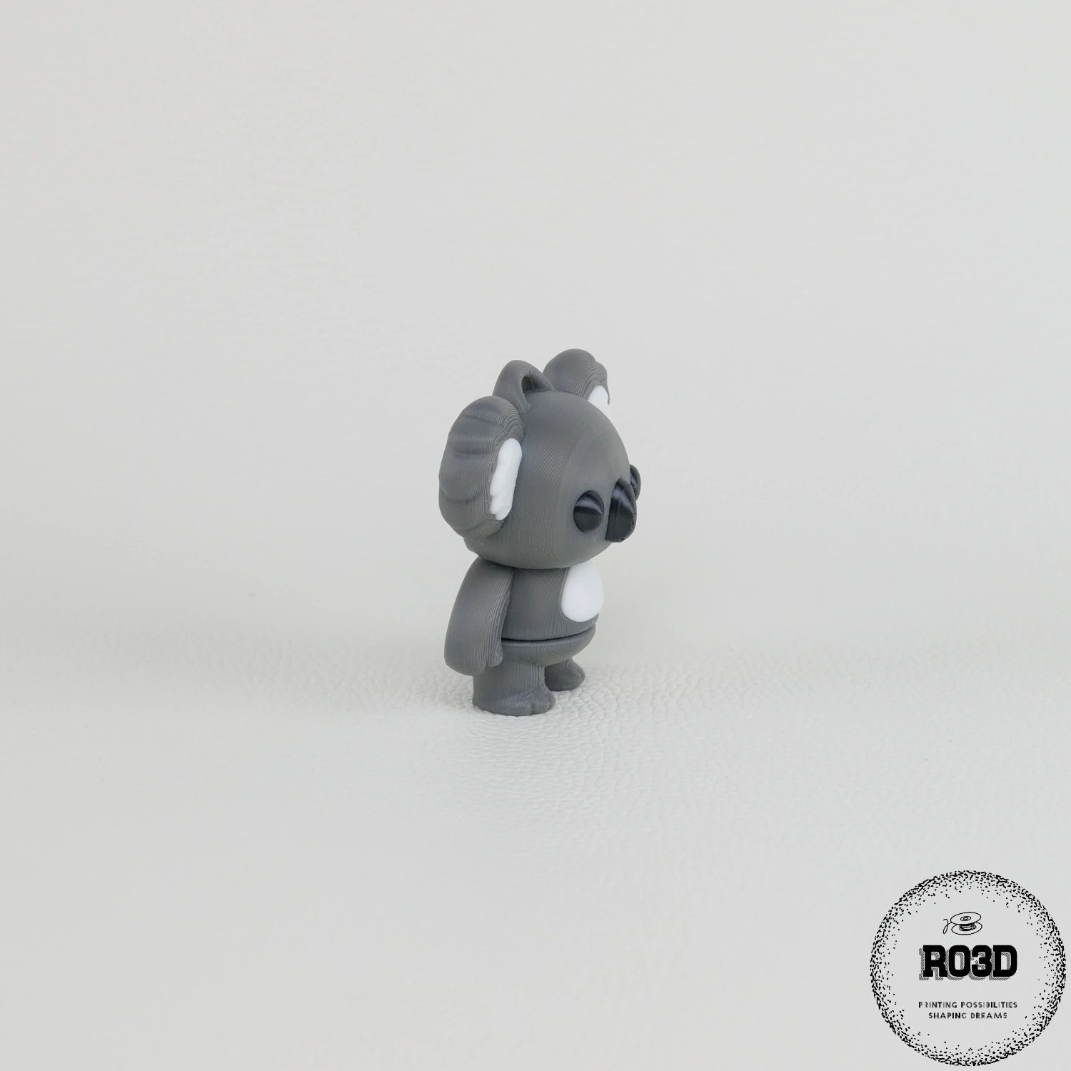 Flexi Koala - Koala Articulat 3D, vedere laterală cu corp segmentat articulat și nas mare caracteristic