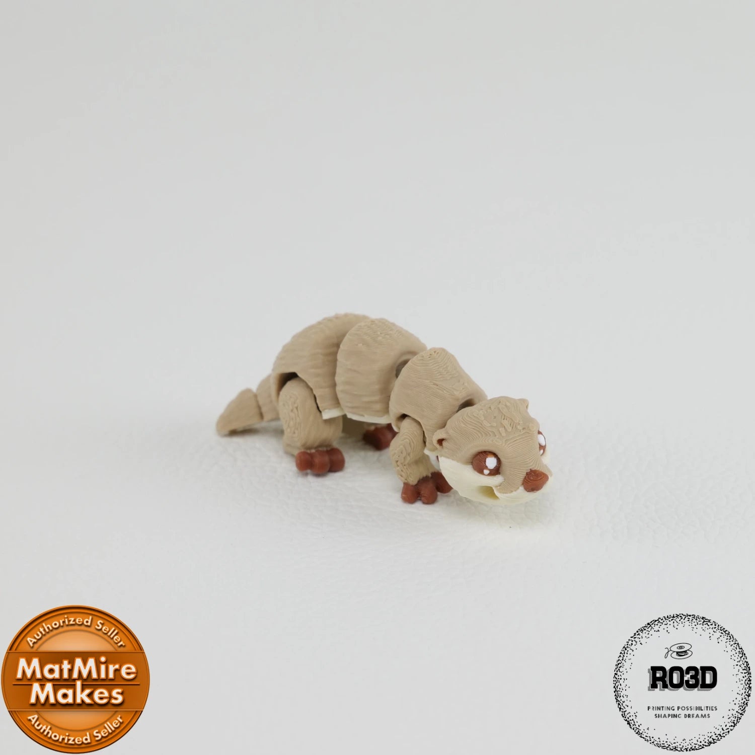Mini River Otter - Vidră de Râu Articulată 3D, vedere laterală cu corp segmentat flexibil și membre articulate scurte