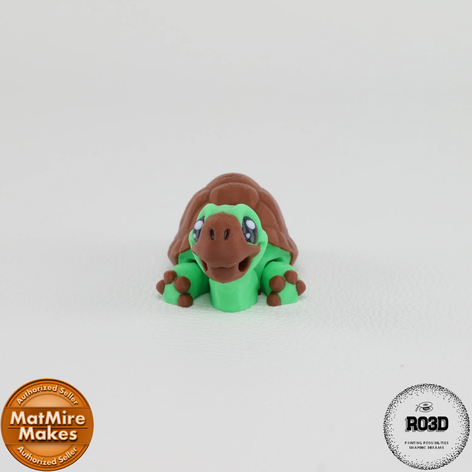 Mini Tortoise - Broască Țestoasă Articulată 3D cu Breloc, vedere laterală opusă cu articulații vizibile