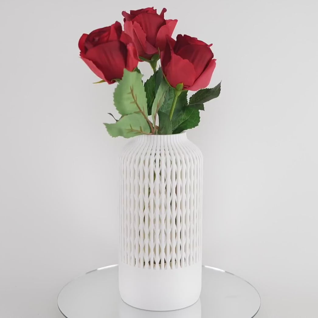 Vellis - perspectivă design geometric minimalist cu suprafețe netede, vază decorativă compactă pentru aranjamente botanice